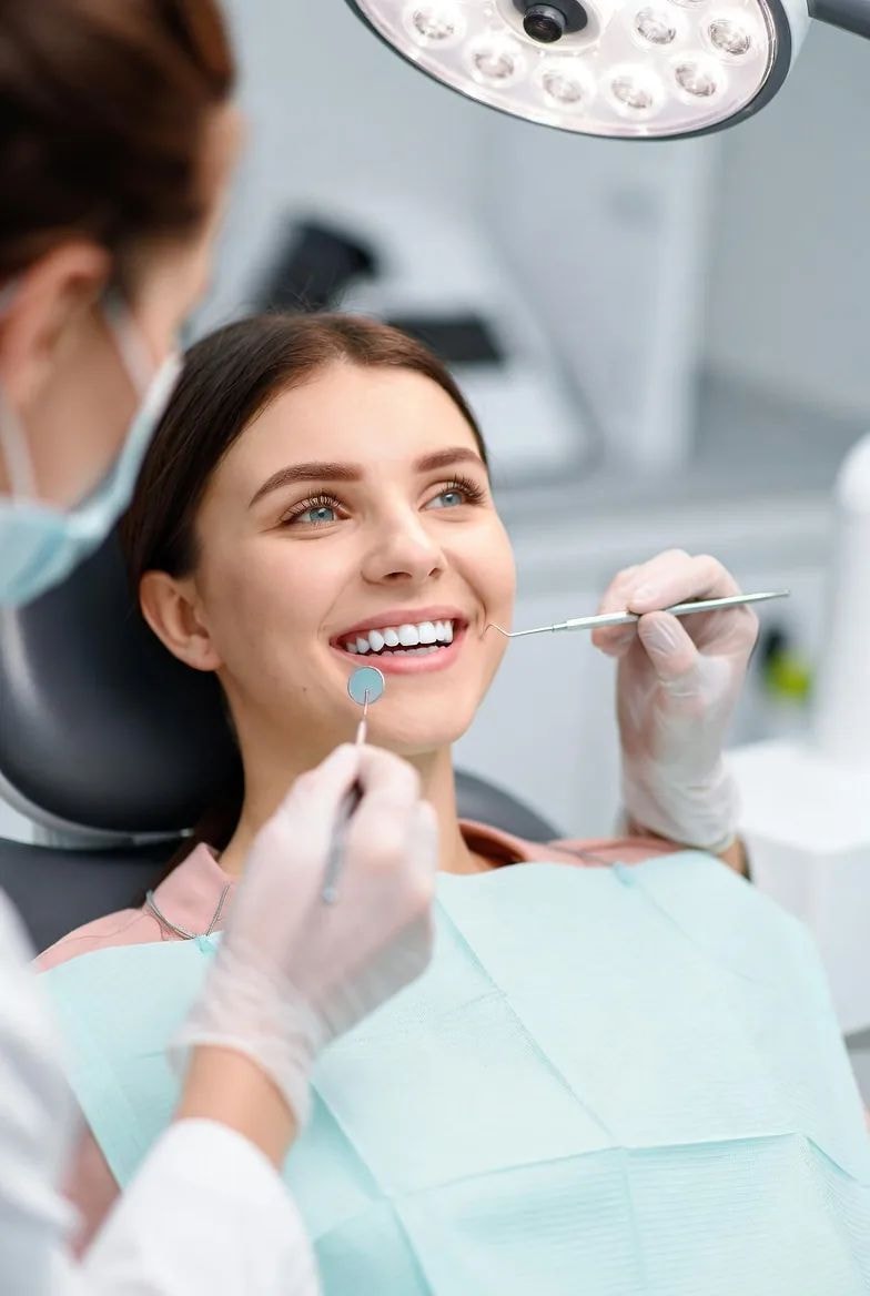 Smiling woman at a dental visit