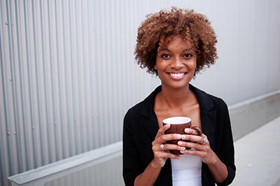 woman smiling after cosmetic dentistry appointment