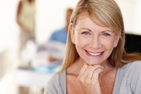 woman smiling after getting dentures from Largo Dental & Implant Center in Largo, FL